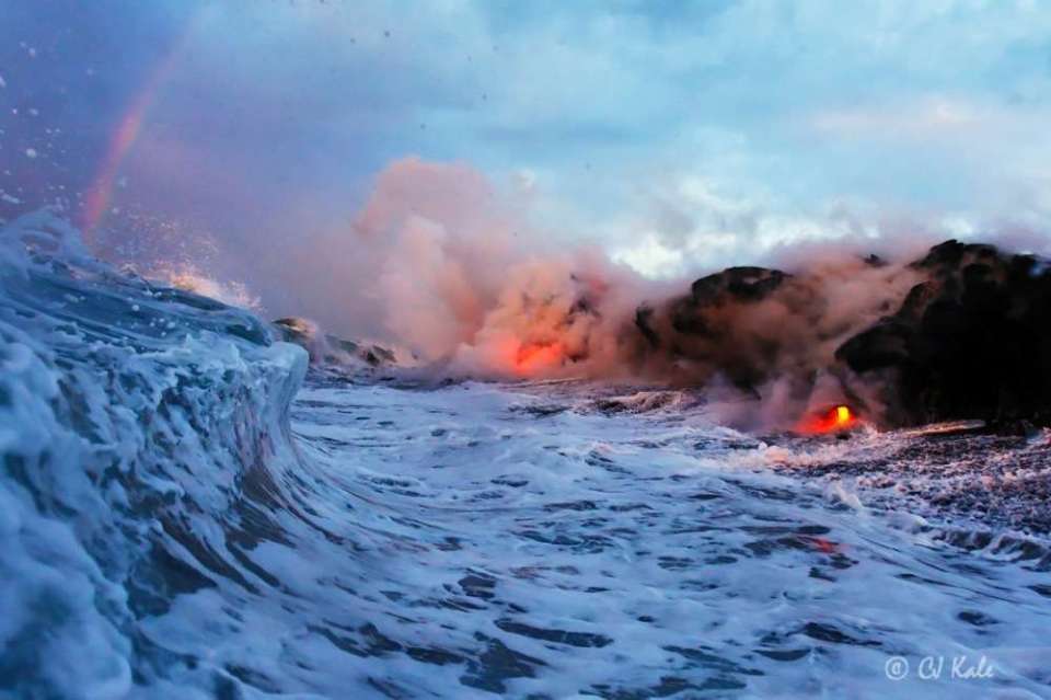 Rainbow, Lava, Waves To me, this image summarizes the story of the pounding surf, the flying debris from the volcano, the intense heat and the danger. And yet, there is a silent beauty in the photograph...
